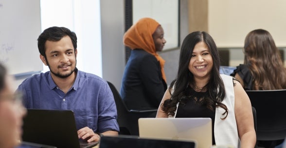 Image of Thunderbird students happy in class.