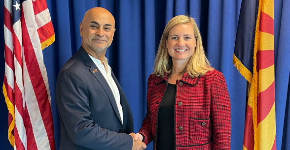 Dean Khagram and Mayor Katie Hobbs shake hands