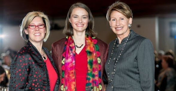 Barbara Barrett (R), the champion of Project Artemis, with Thunderbird for Good leaders, Kellie Kreiser (L) and Wynona Heim (C).