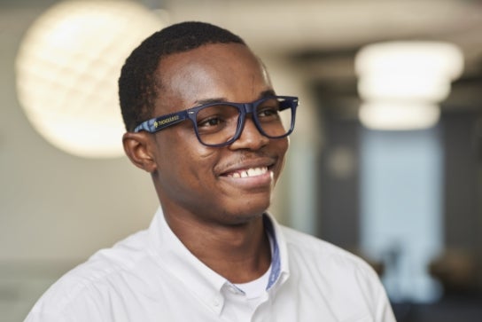 Image of a Thunderbird student smiling