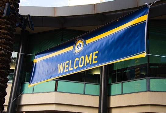Welcome sign at convocation with Thunderbird logo